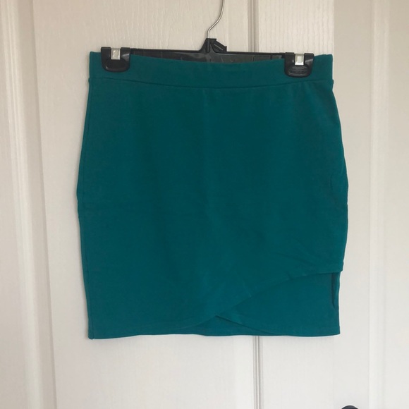 Aritzia Talula teal coloured, stretchy, snug mini skirt - Picture 1 of 5